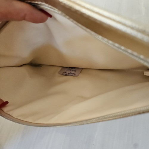 Givenchy pouch like new, gold