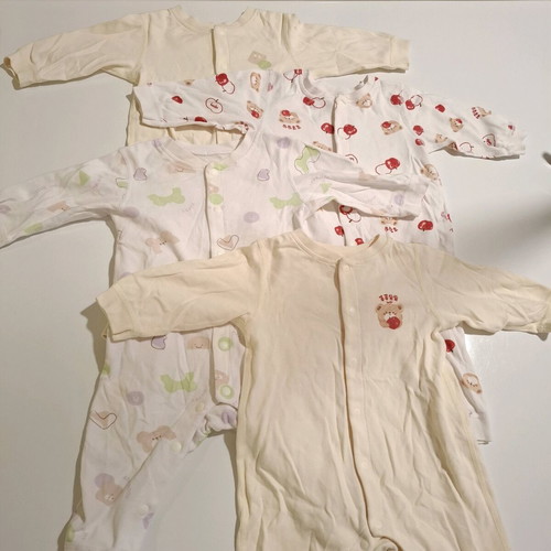 Labi Baby set of 4 full-body baby rompers like new 3-6 months