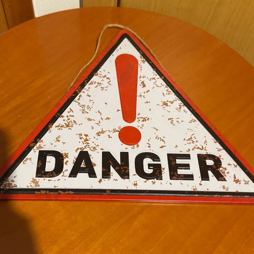 Decorative metal signs set like new, Danger and Cappuccino with hanging rope
