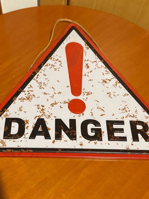 Decorative metal signs set like new, Danger and Cappuccino with hanging rope