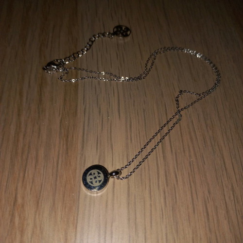 Ozze necklace new, silver color