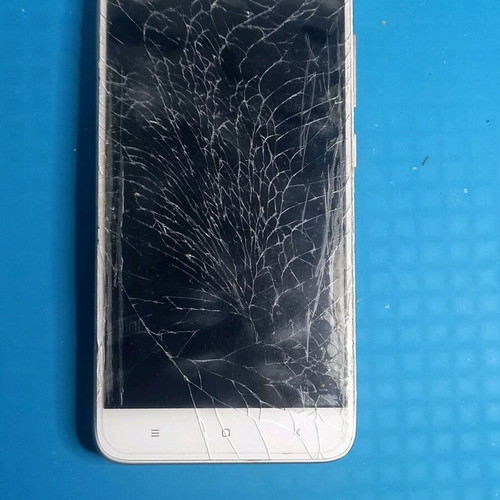 Xiaomi Redmi 4x used parts with broken screen and swollen battery