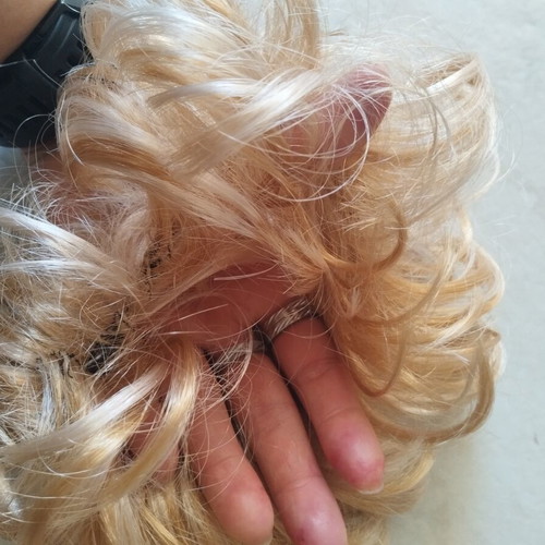 Hair extension with short blonde hair, like new