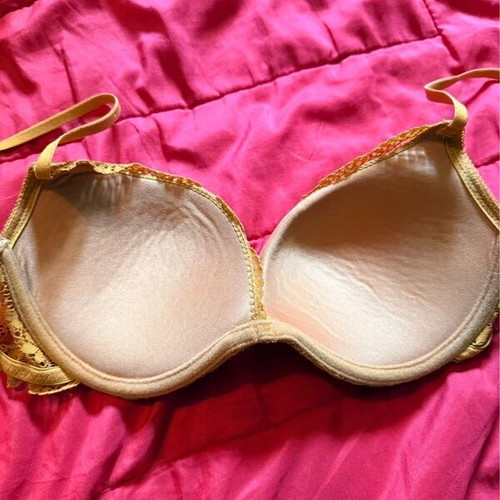 Bra 75C like new, mustard lace with padding and underwire