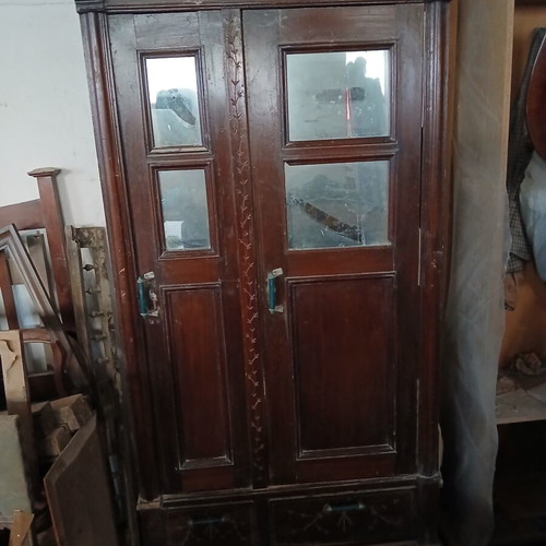 Vintage wooden antique wardrobe with mirrors and drawers