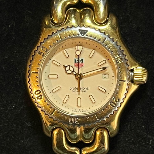 TAG Heuer watches used, gold and silver colors