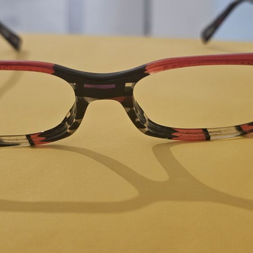 Alain Mikli eyeglass frame used, black and red