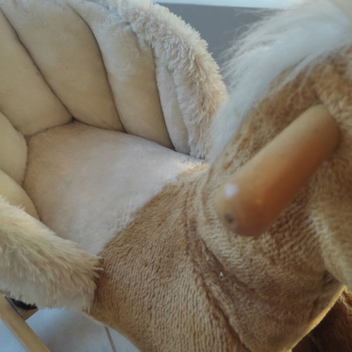 Wooden rocking horse like new with plush carriage