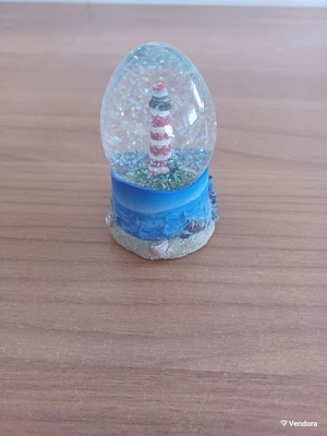 Ceramic lighthouse snow globe decorative item like new