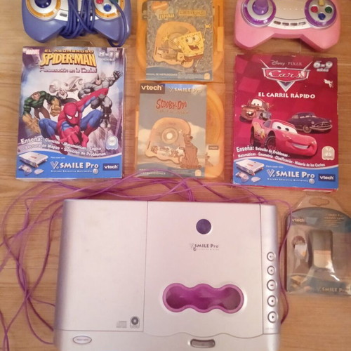 VTech Smile Pro and Lexibook consoles used with games and controllers