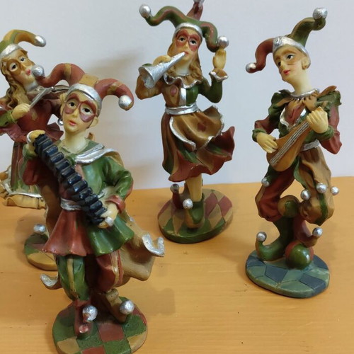 Musical figures handmade rare set of 4 polyresin like new