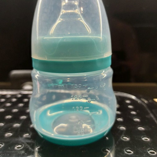 Cangaroo Cara manual breast pump like new with 30 Lansinoh milk storage bags