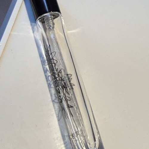 Diptique empty bottle with applicator used