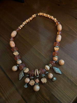Necklace in like new condition, beige and brown