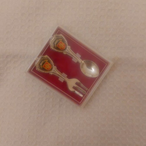 Collectible Switzerland spoon and fork set like new, in box