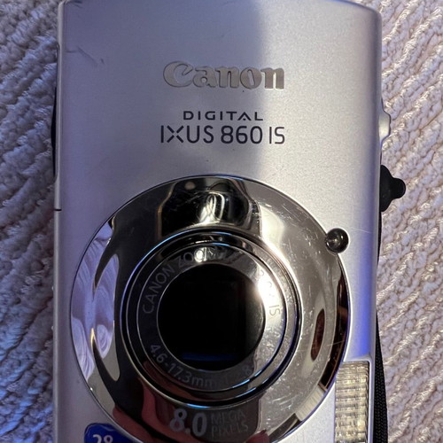 Canon digital camera used with case and charger