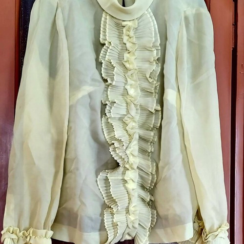 Silk shirt used in yellow color size L