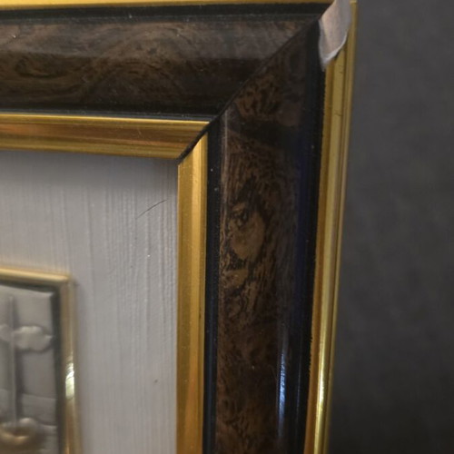 Decorative frame with embossed metal artwork used, made in Italy