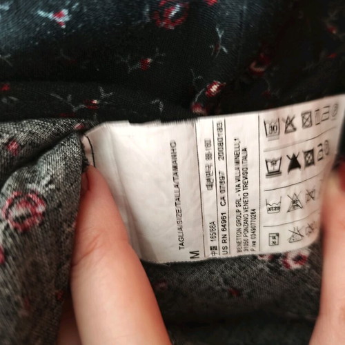 Benetton women's dress size M like new, black with floral pattern