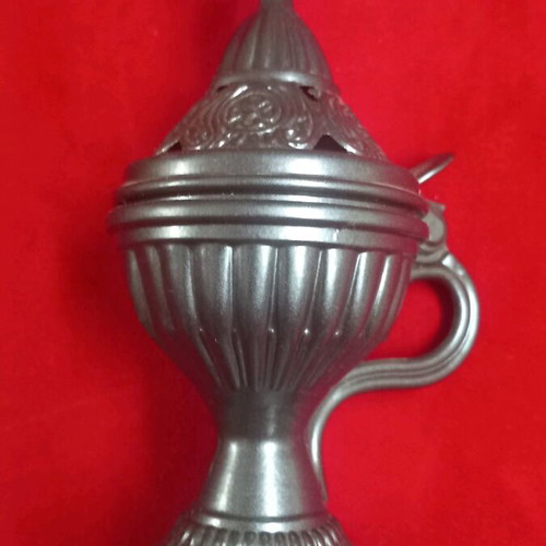 Metal incense burner new in lead color unchanged