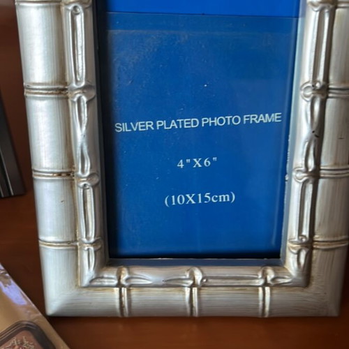 Set of 4 photo frames and 1 small album
