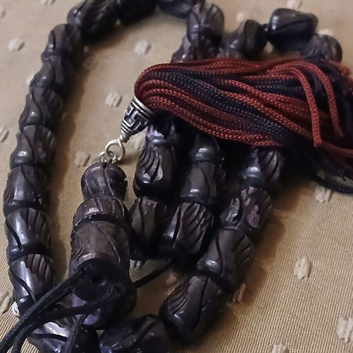 Komboloi bone engraved worry beads used with metal elements and tassel