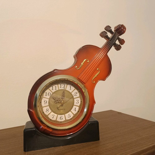 Quartz table clock in violin shape like new