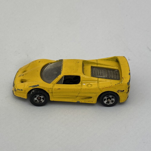 Ferrari F50 Hot Wheels toy car used, yellow, scale 1:64