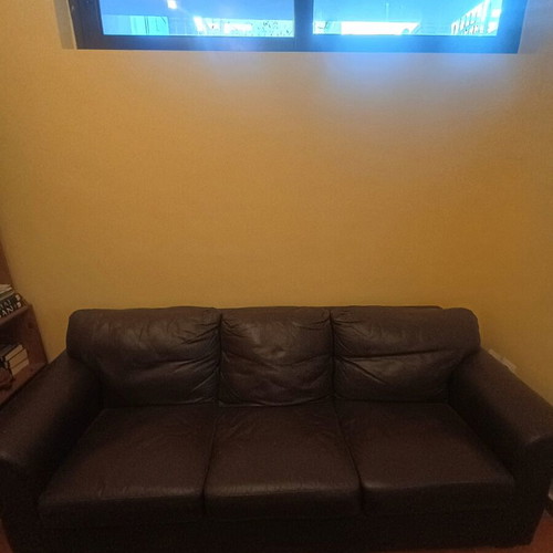 Three-seater leather sofa used