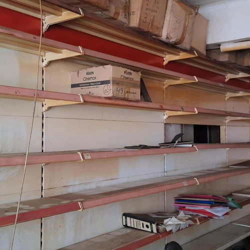 Professional shelving used with display cabinets