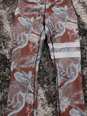 Women's floral leggings used, size XS, multicolor with slight yellowing