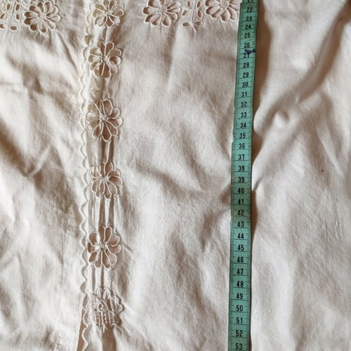 Traditional white shirt with cutwork embroidery used