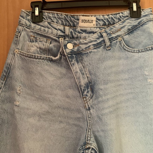Jeans with asymmetrical buttoning like new, size M, blue