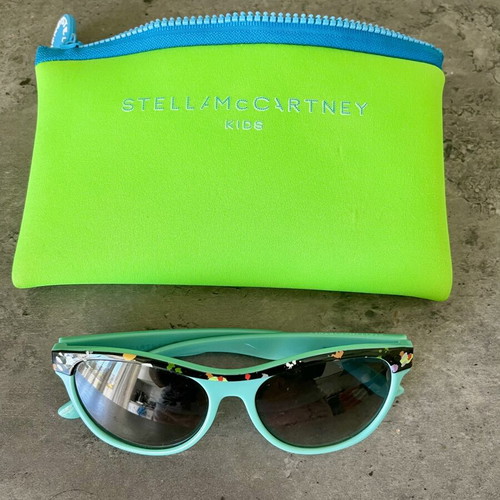 Stella McCartney Kids Sunglasses used, turquoise frame with colorful design