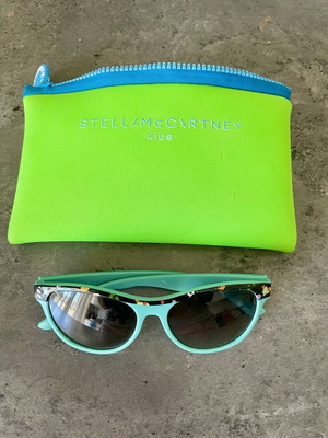 Stella McCartney Kids Sunglasses used, turquoise frame with colorful design