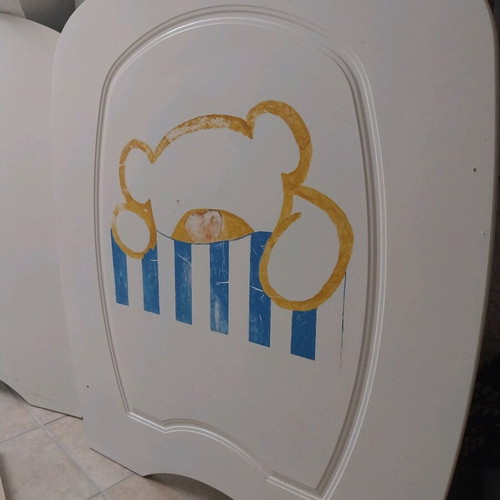 Baby cot used with accessories and fresh sheets