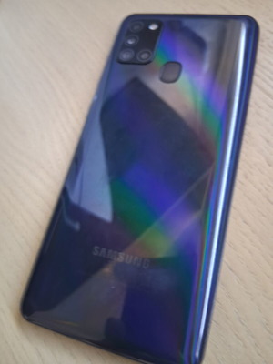 Samsung Galaxy A21s smartphone with accessories