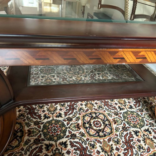 Coffee table like new walnut wood with brass lion legs and glass top