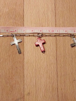 925 Silver bracelet like new with 5 dangling crosses