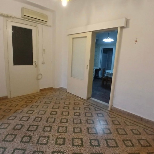 Ground floor apartment 88 sqm with yard and storage in Agia Sofia Piraeus