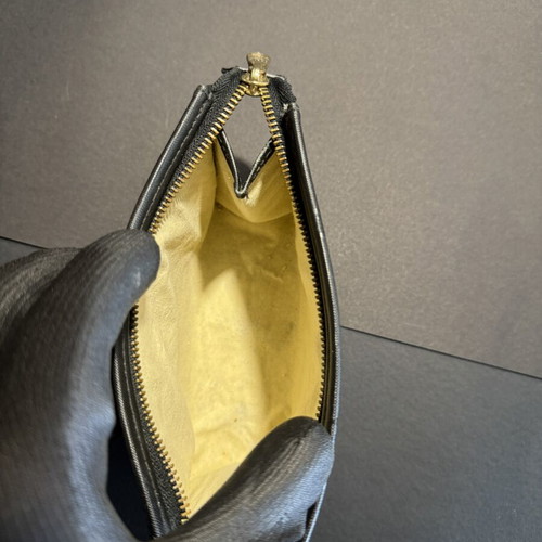 MCM Monogram Mini Toiletry Bag used, black with gold zipper