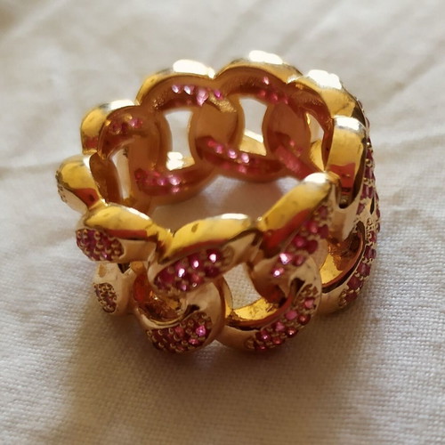 Ring with pink stones new, gold color
