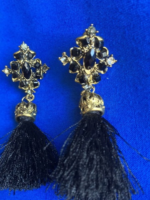 Gold and black earrings with tassel