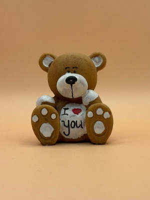 Teddy bear decorative used with i love you quote