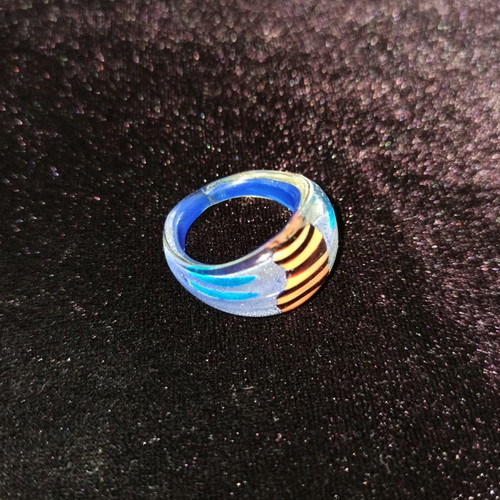 Murano ring like new with blue, orange and black colors and silver leaf