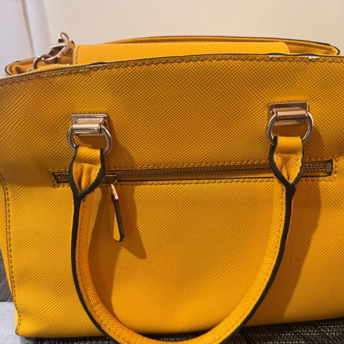 Guess bag used with minor scratch on corner