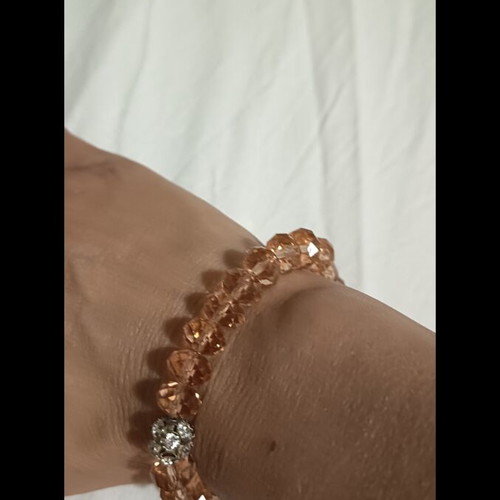 Beaded bracelet like new, beige and silver
