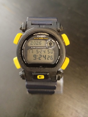 Casio G-Shock DW-9050 wristwatch used without bezel, black and blue