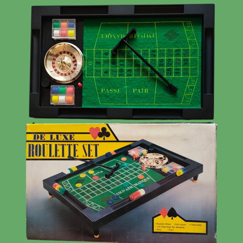 Retro tabletop roulette set used with chips and box