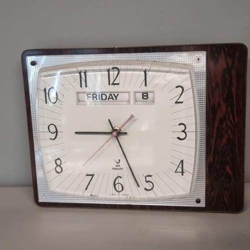 Vintage wall clock with date used, analog